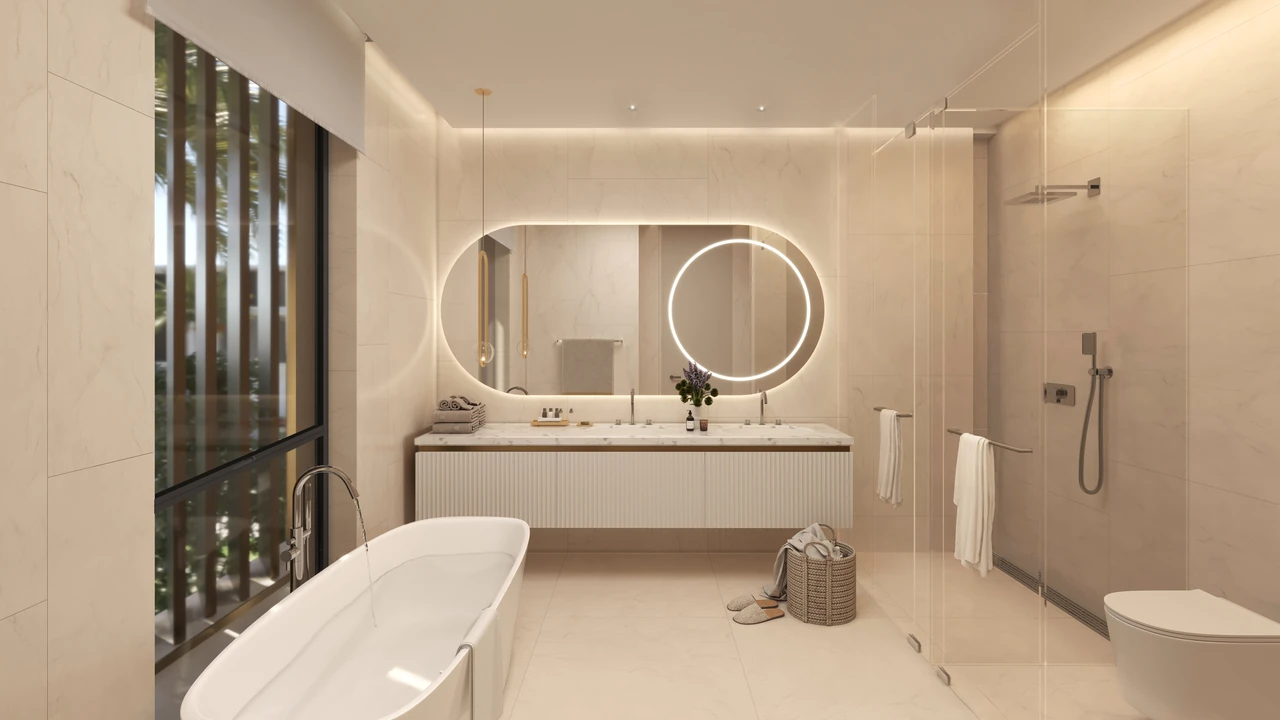 Frond A by Nakheel in Palm Jebel Ali Red Aurora villa bathroom with freestanding bath twin lit mirrors double vanity and walk in shower in Dubai - Presented by Tohid Fetrat