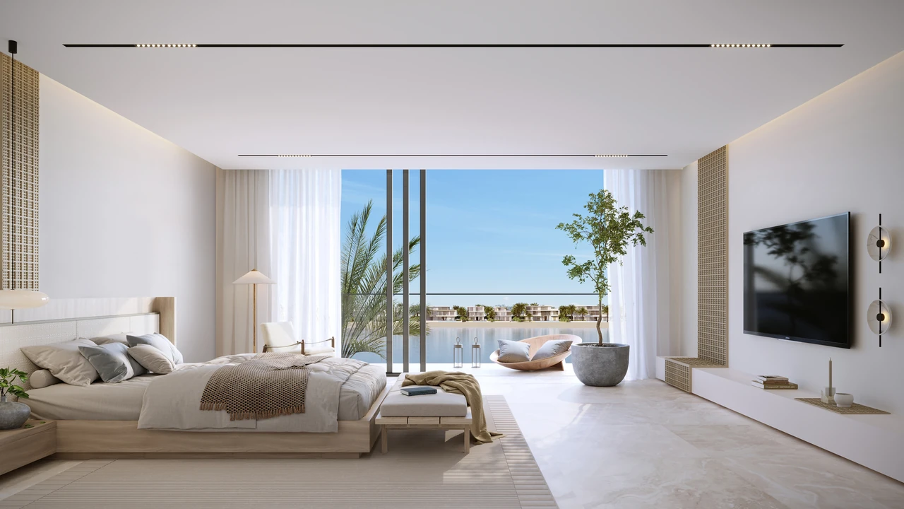 Frond B by Nakheel in Palm Jebel Ali Sunset Mirage villa bedroom interior with full height glazing warm timber finishes and sea view in Dubai - Presented by Tohid Fetrat
