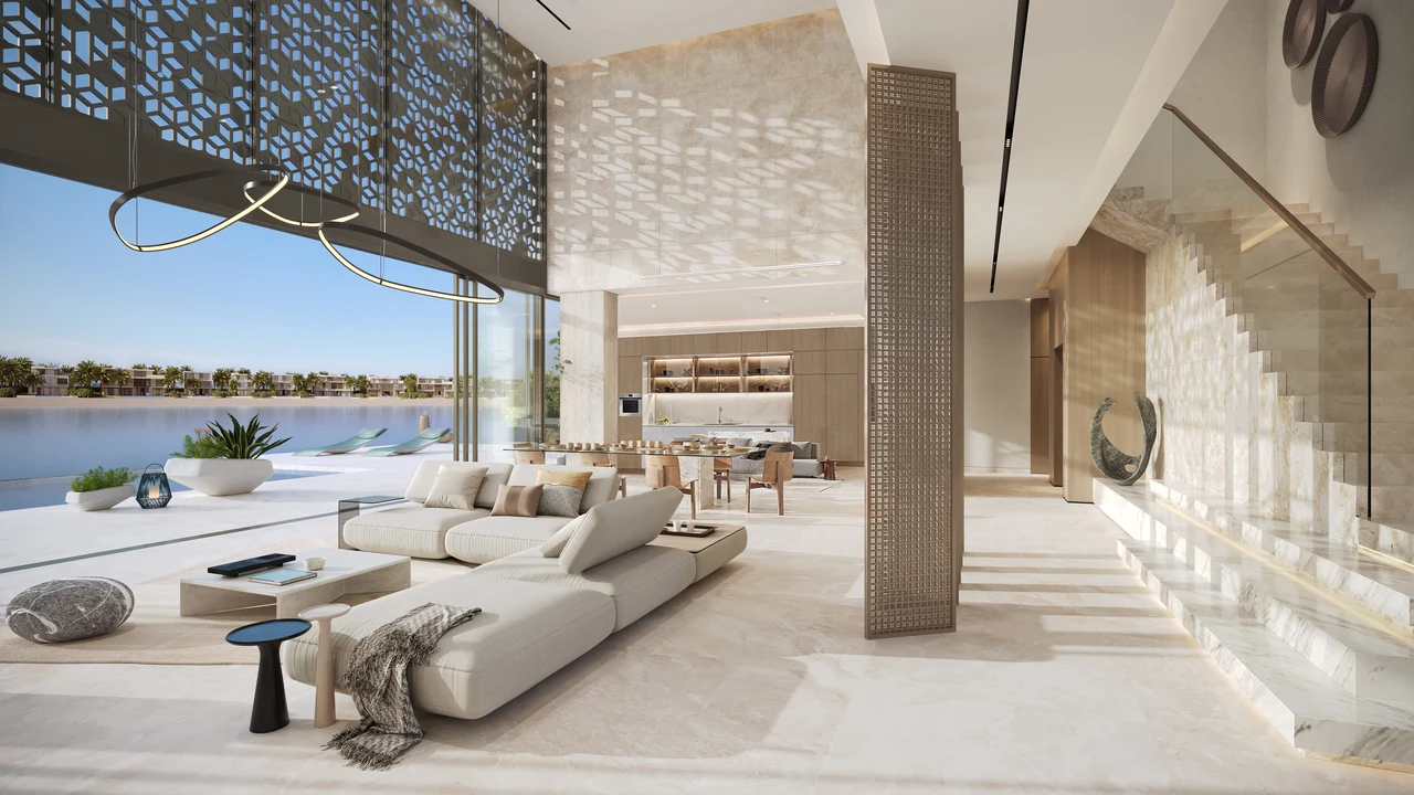 Frond B by Nakheel in Palm Jebel Ali Sunset Mirage villa dining and living interior with open plan layout designer furnishings and glazed outlook in Dubai - Presented by Tohid Fetrat