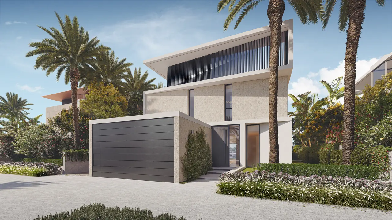 Frond C by Nakheel in Palm Jebel Ali Blue Jay villa street elevation with sculpted white facade planted forecourt and covered entrance in Dubai - Presented by Tohid Fetrat
