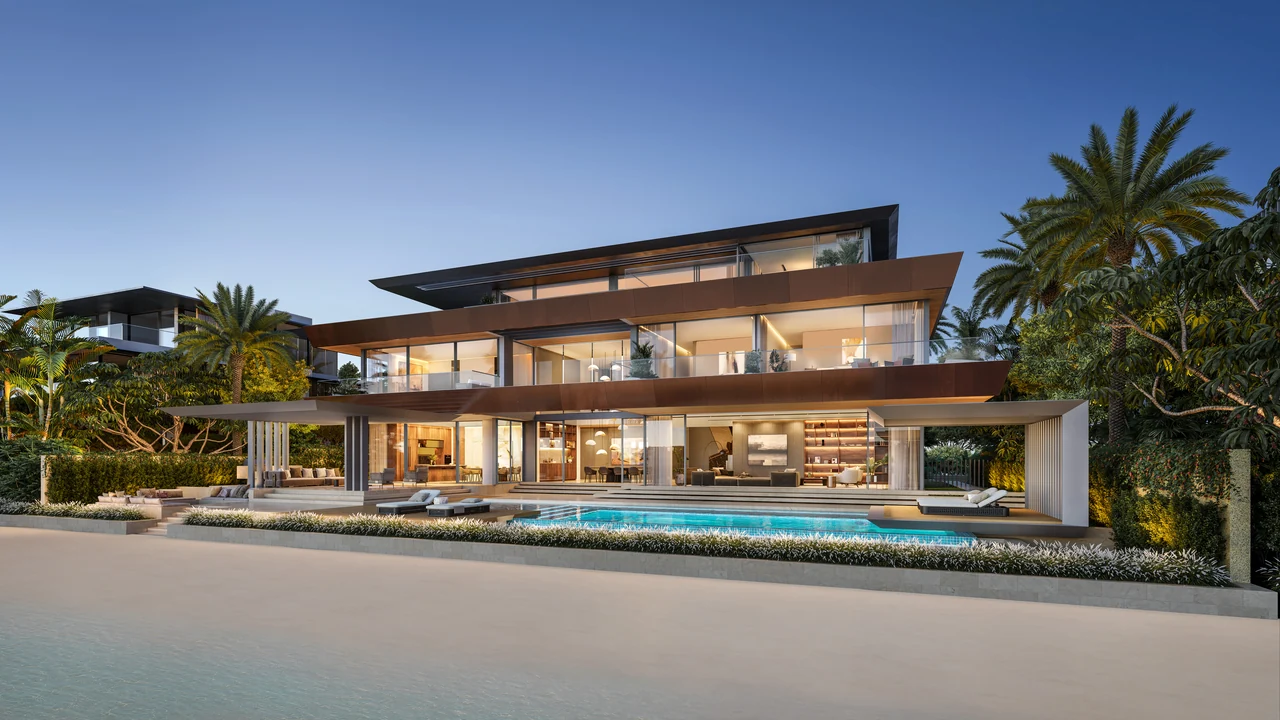 Frond C by Nakheel in Palm Jebel Ali Amber Reef villa exterior with private pool deck sun loungers and open water beyond in Dubai - Presented by Tohid Fetrat