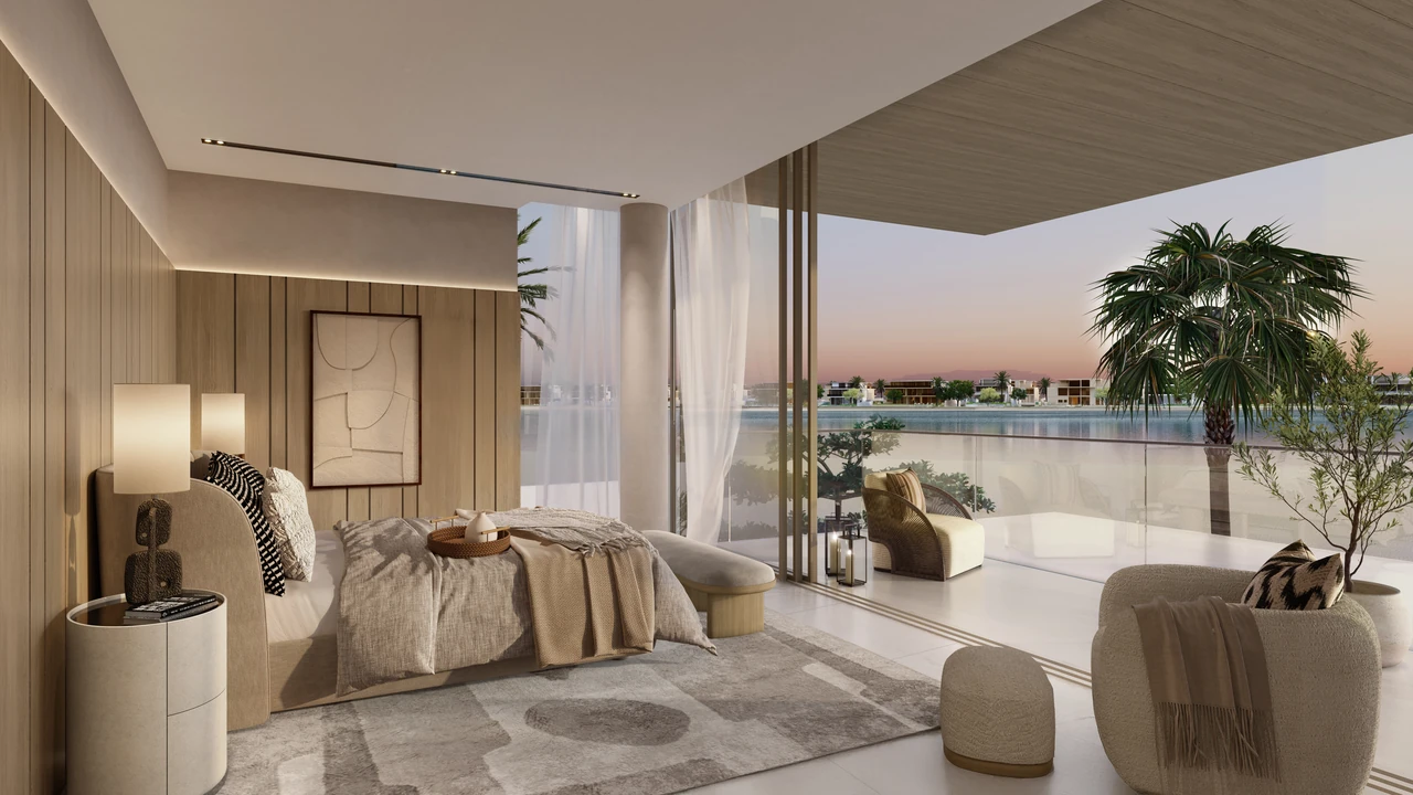 Frond F by Nakheel in Palm Jebel Ali Wave Crest villa bedroom design detail with upholstered headboard warm neutral palette and layered lighting in Dubai - Presented by Tohid Fetrat