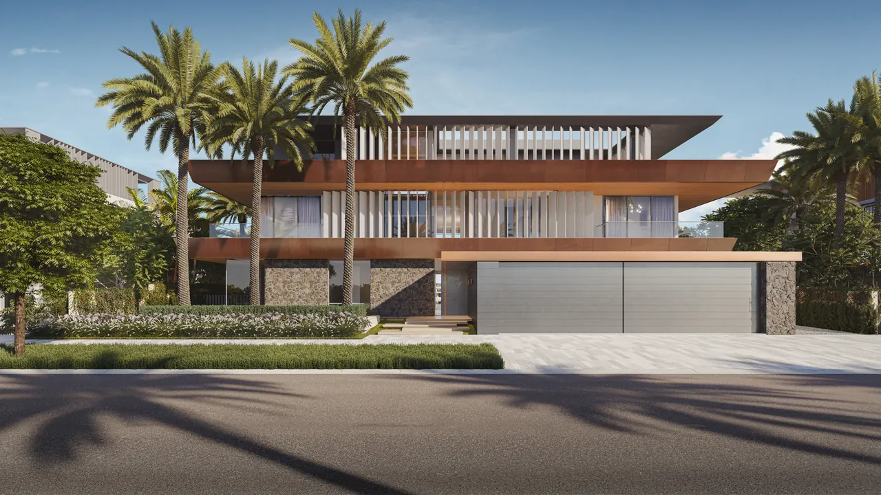 Frond F by Nakheel in Palm Jebel Ali Amber Reef villa entrance and driveway in the evening with lit facade and landscaped forecourt in Dubai - Presented by Tohid Fetrat