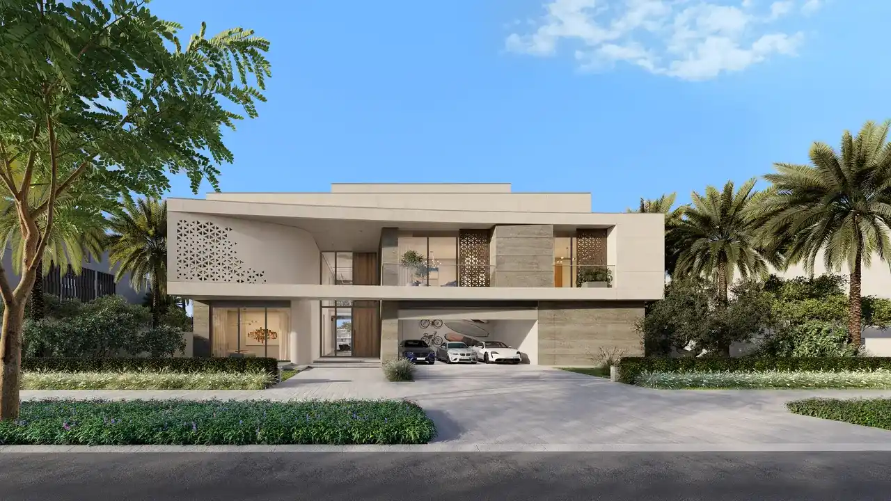 Frond F by Nakheel in Palm Jebel Ali Coral Dune villa facade at sunset with landscaped driveway and warm stone elevation in Dubai - Presented by Tohid Fetrat