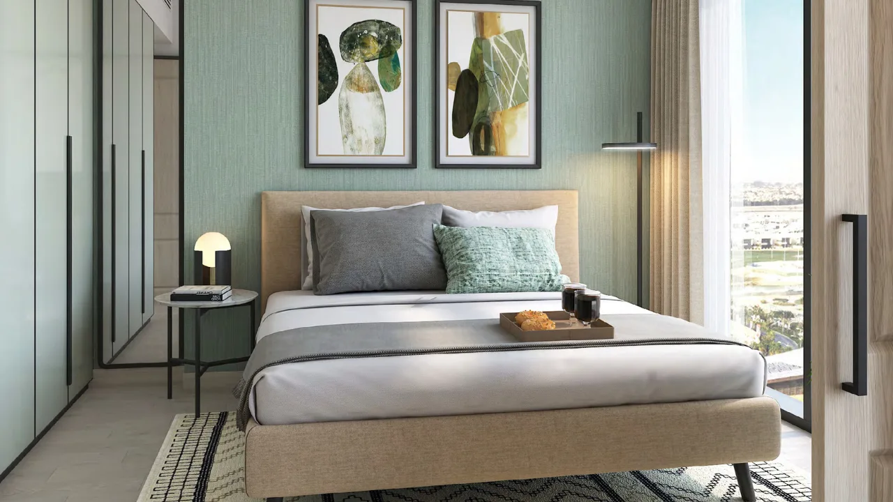 Golf Gate 2 at DAMAC Hills by DAMAC Properties contemporary bedroom with elegant furnishings floor to ceiling windows and community views in Dubai Presented by Tohid Fetrat