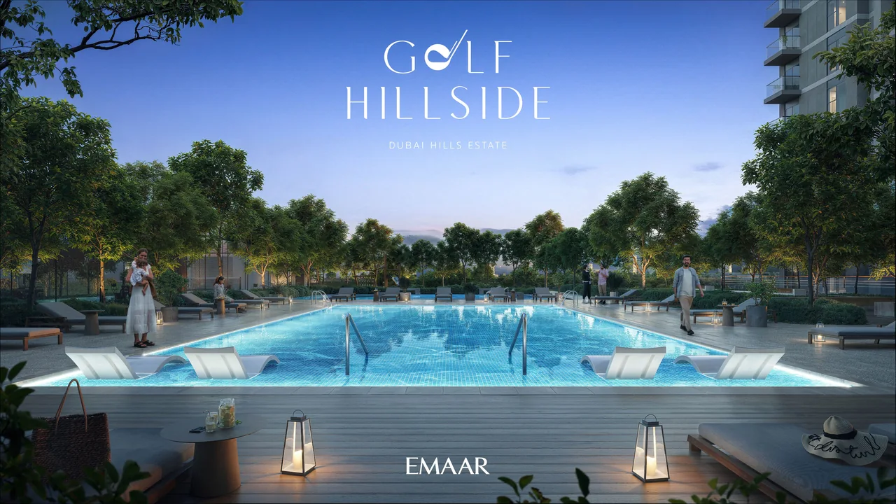 Golf Hillside by Emaar in Dubai Hills Estate resort style swimming pool deck with sun loungers shaded seating and landscaped terrace beside the golf course in Dubai - Presented by Tohid Fetrat