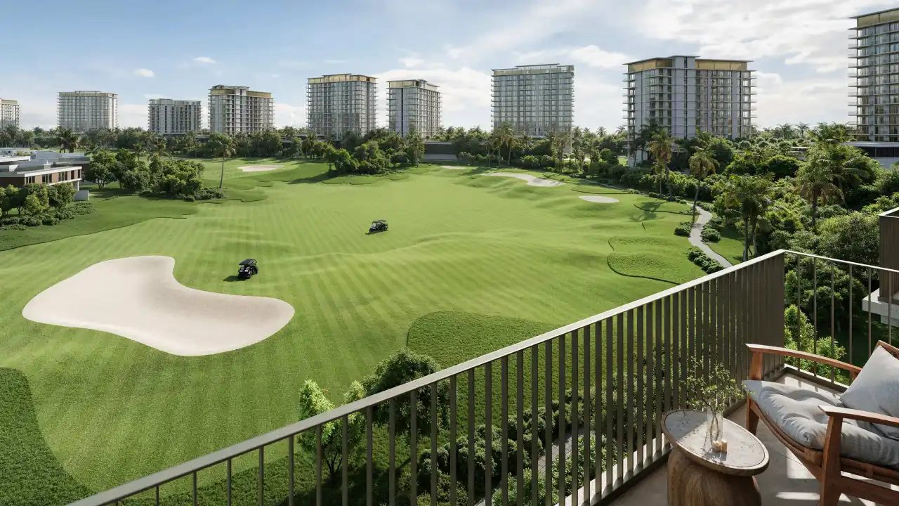 Golf Trails at Emaar South by Emaar Properties apartment balcony overlooking the championship golf course and contemporary residential towers in Dubai Presented by Tohid Fetrat