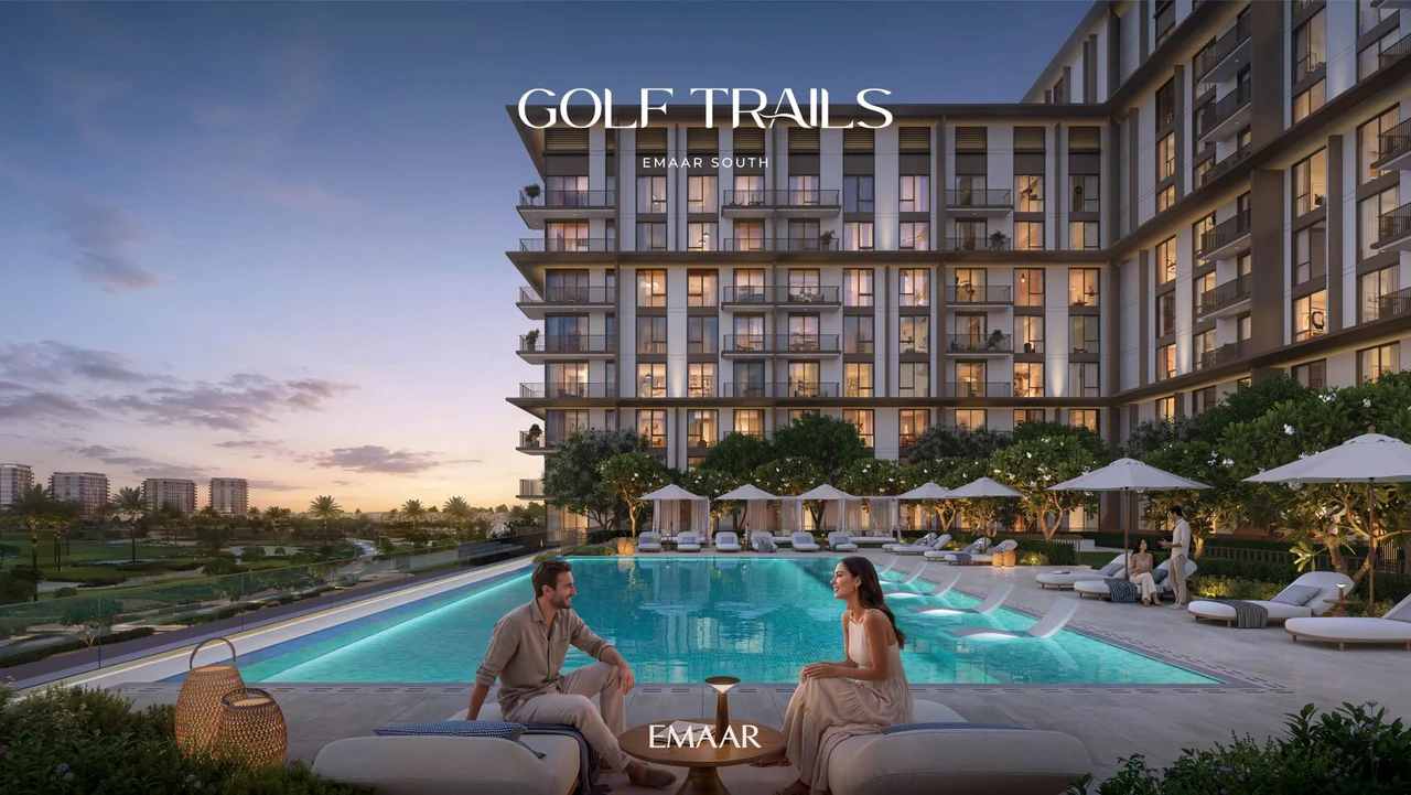 Golf Trails by Emaar in Emaar South outdoor pool deck amenity with sun loungers shaded seating and landscaped garden surroundings in Dubai - Presented by Tohid Fetrat