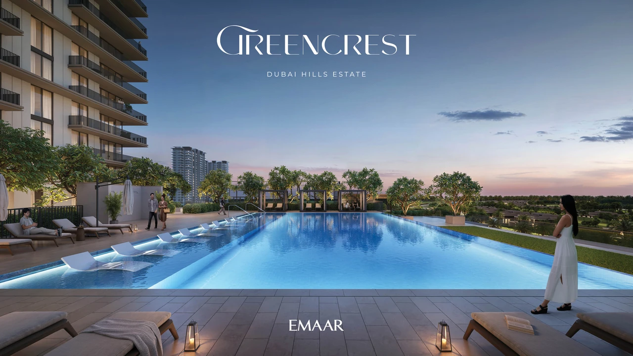 Greencrest by Emaar in Dubai Hills Estate outdoor swimming pool deck with sun loungers shaded seating and landscaped terrace in Dubai - Presented by Tohid Fetrat