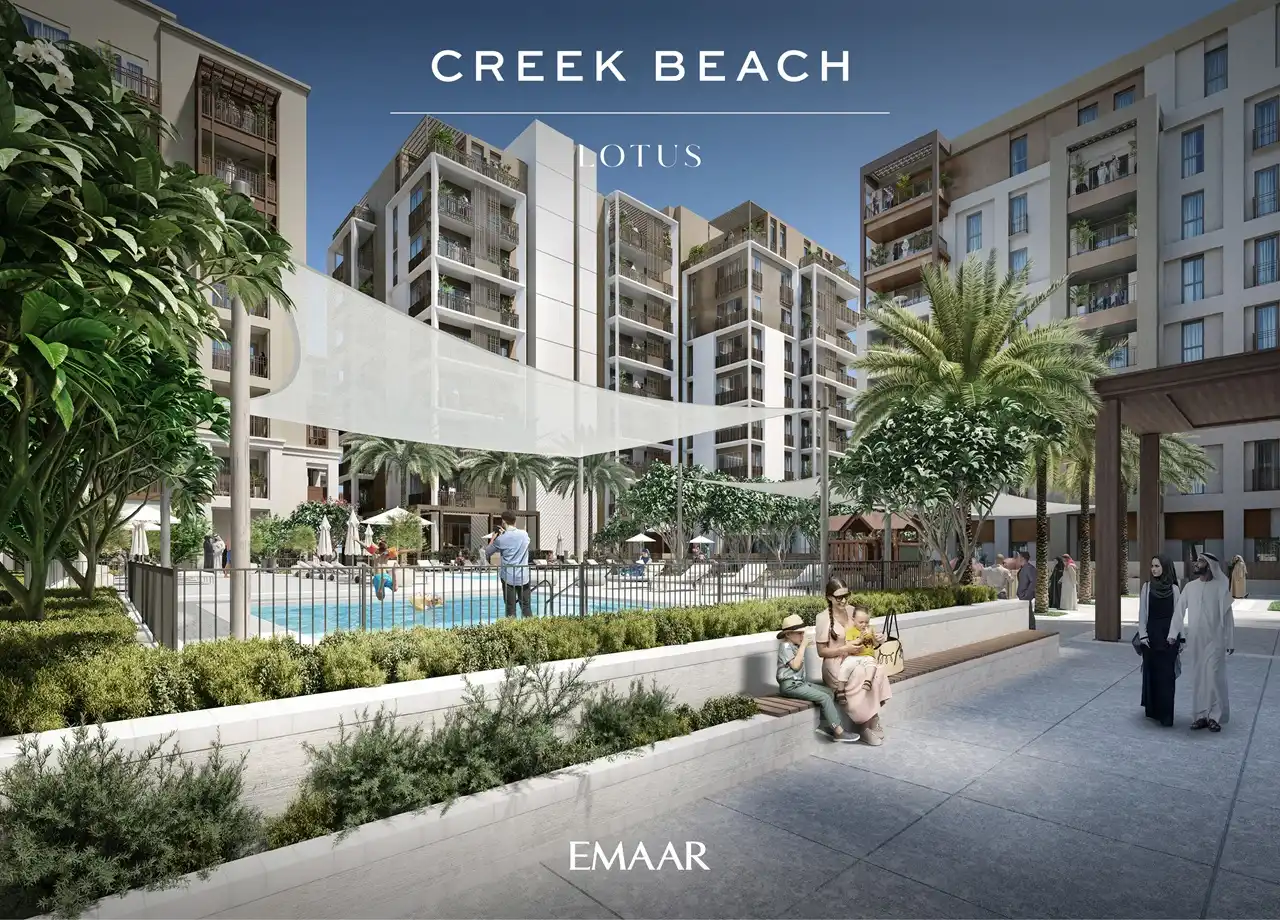 Lotus at Dubai Creek Harbour by Emaar Properties featuring the landscaped pool courtyard with contemporary residential buildings, shaded seating areas, and lush greenery in Dubai Presented by Tohid Fetrat