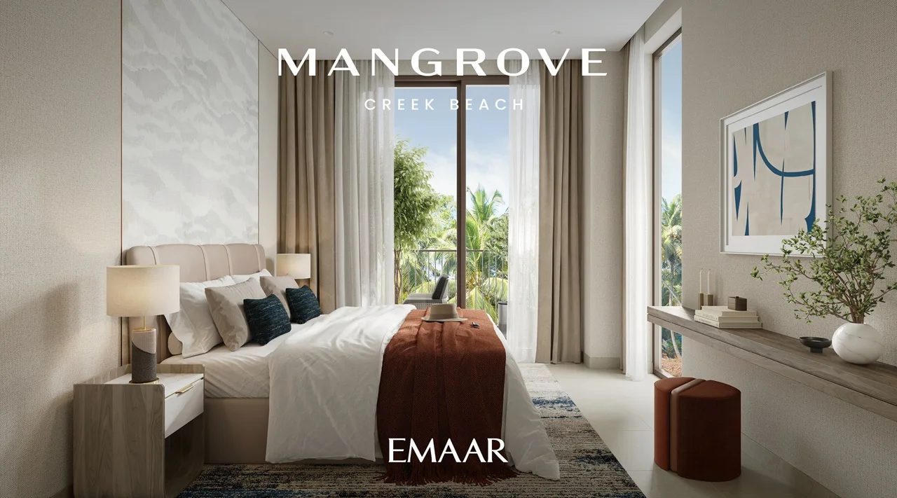 Mangrove at Dubai Creek Harbour by Emaar Properties elegant bedroom interior with soft bedding, floor to ceiling windows, warm accents and greenery views in Dubai Presented by Tohid Fetrat