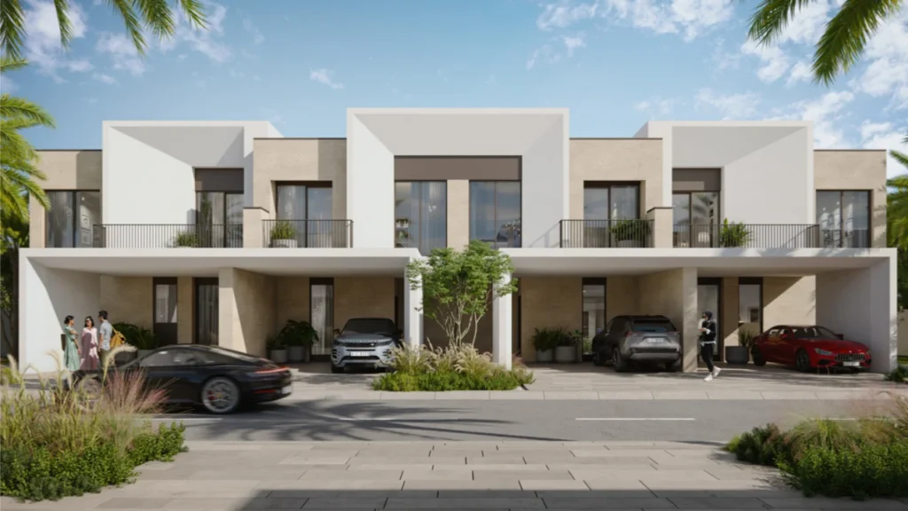 May at Arabian Ranches 3 by Emaar Properties contemporary townhouse front elevation with covered parking and landscaped frontage in Dubai Presented by Tohid Fetrat