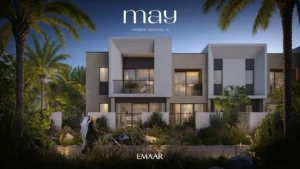 May at Arabian Ranches 3 by Emaar Properties contemporary townhouses illuminated at night with landscaped gardens in Dubai Presented by Tohid Fetrat