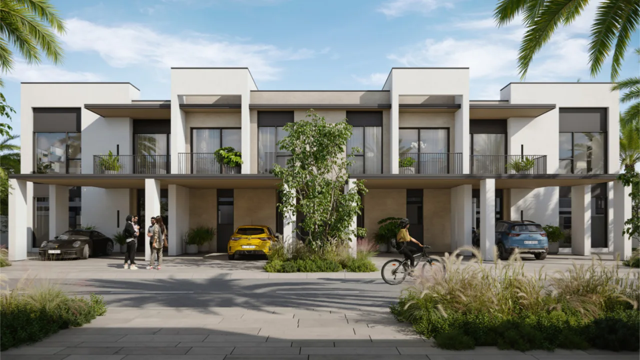 May at Arabian Ranches 3 by Emaar Properties contemporary townhouse street view with landscaped frontage and covered parking in Dubai Presented by Tohid Fetrat