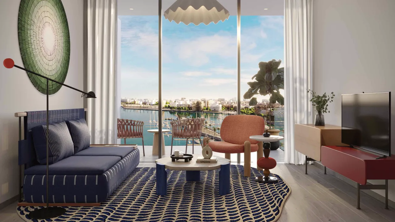 Nautica One by Select Group in Dubai Maritime City contemporary living room with waterfront views through floor to ceiling windows in Dubai Presented by Tohid Fetrat