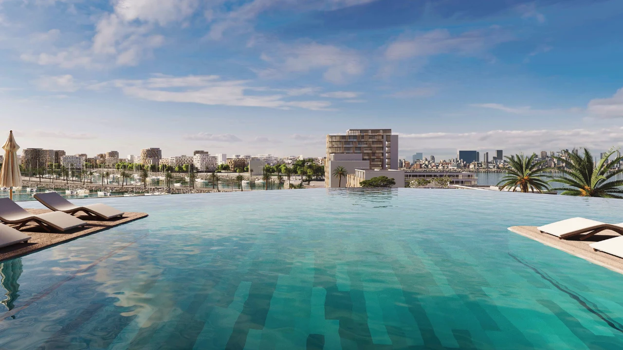 Nautica Two by Select Group in Dubai Maritime City infinity pool overlooking the marina waterfront and Gulf skyline in Dubai Presented by Tohid Fetrat