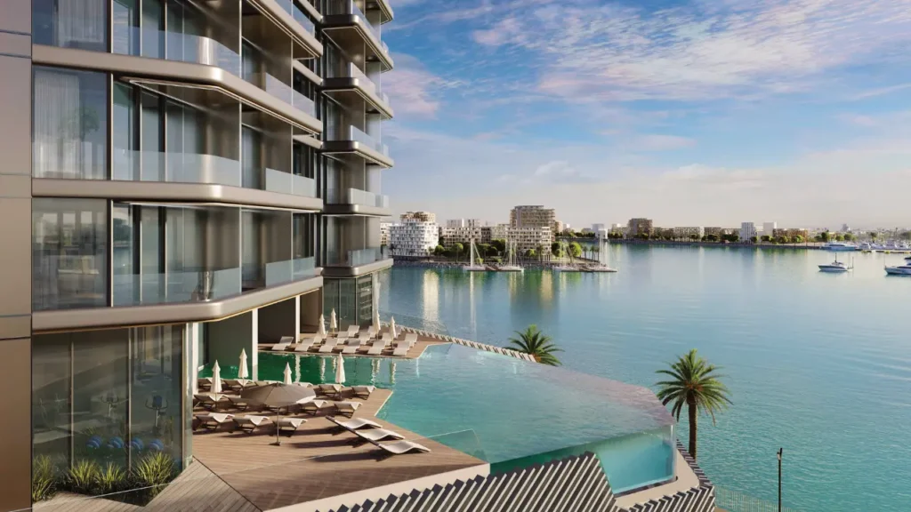 Nautica Two by Select Group in Dubai Maritime City infinity pool overlooking the Gulf waterfront contemporary residences and marina in Dubai Presented by Tohid Fetrat