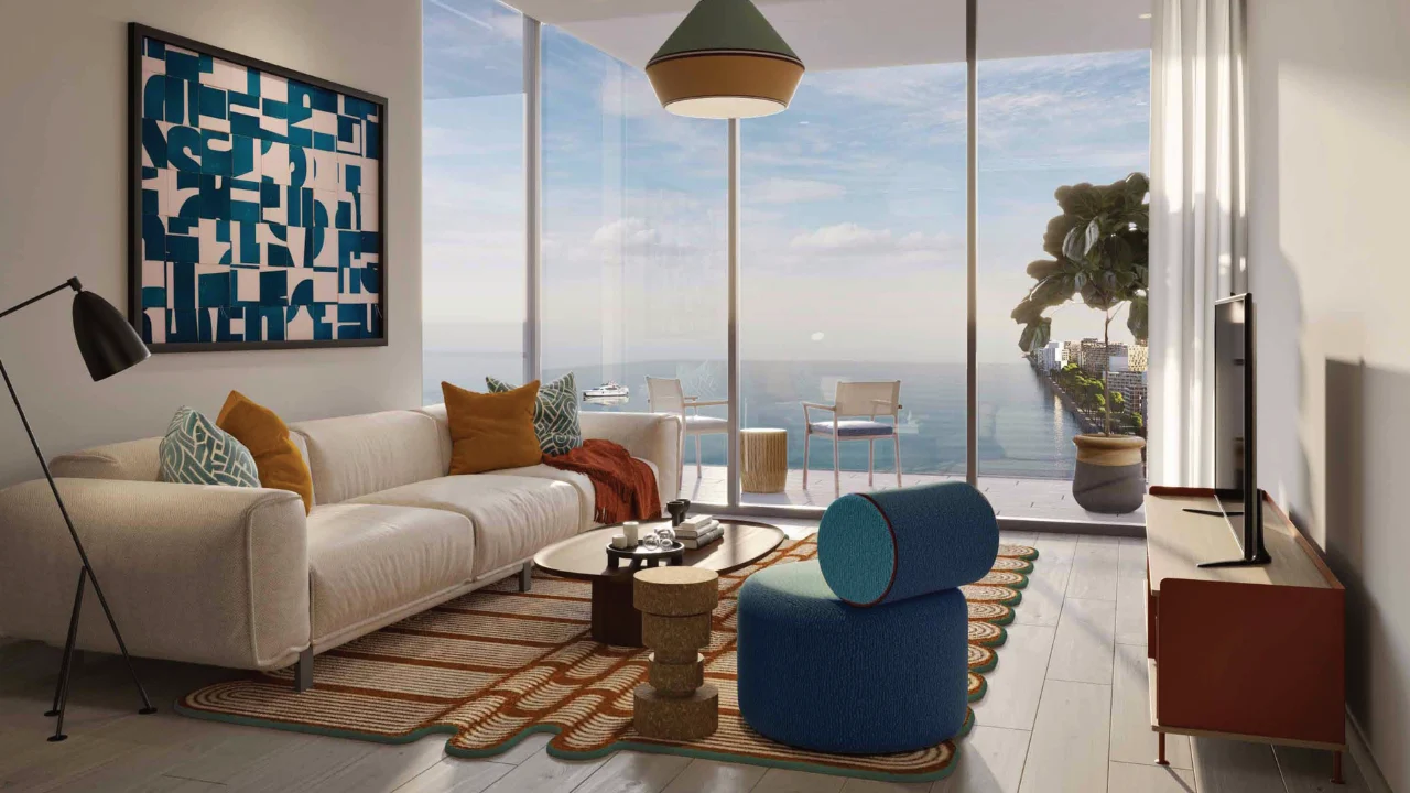 Nautica Two by Select Group in Dubai Maritime City contemporary living room with floor to ceiling windows private balcony and Gulf views in Dubai Presented by Tohid Fetrat