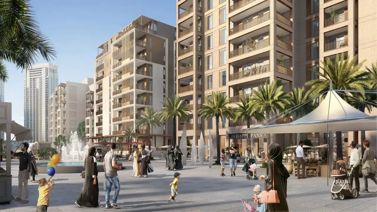 Orchid at Dubai Creek Harbour by Emaar Properties vibrant community plaza with landscaped walkways fountains retail cafés and modern apartment buildings in Dubai Presented by Tohid Fetrat
