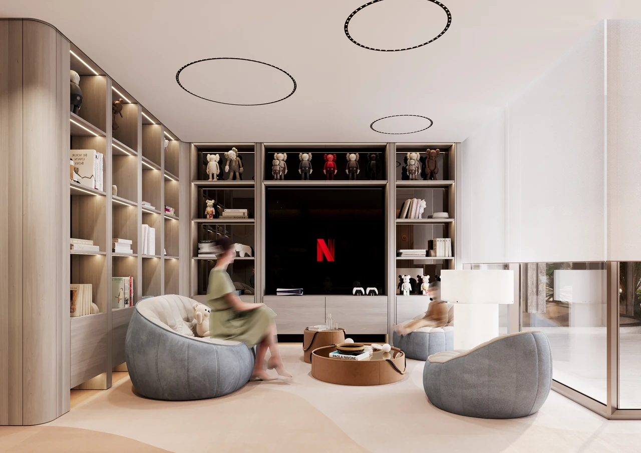 ORLA Infinity Dorchester Collection by Omniyat entertainment lounge with illuminated display shelving large media screen soft lounge seating and gaming area in Dubai - Presented by Tohid Fetrat