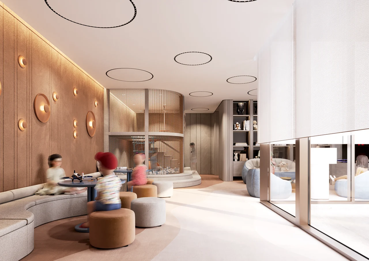 ORLA Infinity Dorchester Collection by Omniyat indoor kids play area with soft climbing structure curved banquette seating activity tables and warm wall lighting in Dubai - Presented by Tohid Fetrat