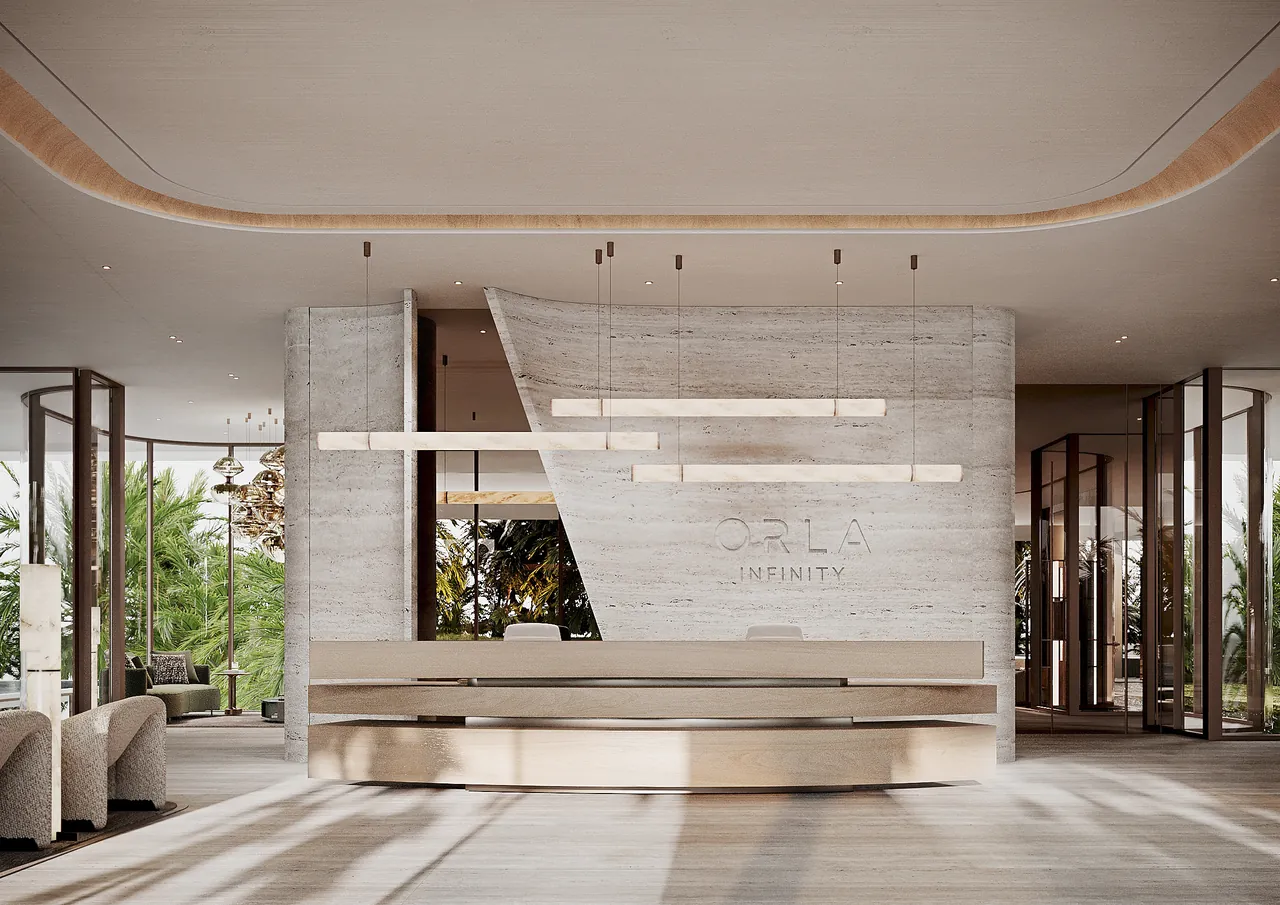 ORLA Infinity Dorchester Collection by Omniyat main lobby with travertine reception wall alabaster lighting and floor to ceiling glazing onto palm gardens in Dubai - Presented by Tohid Fetrat