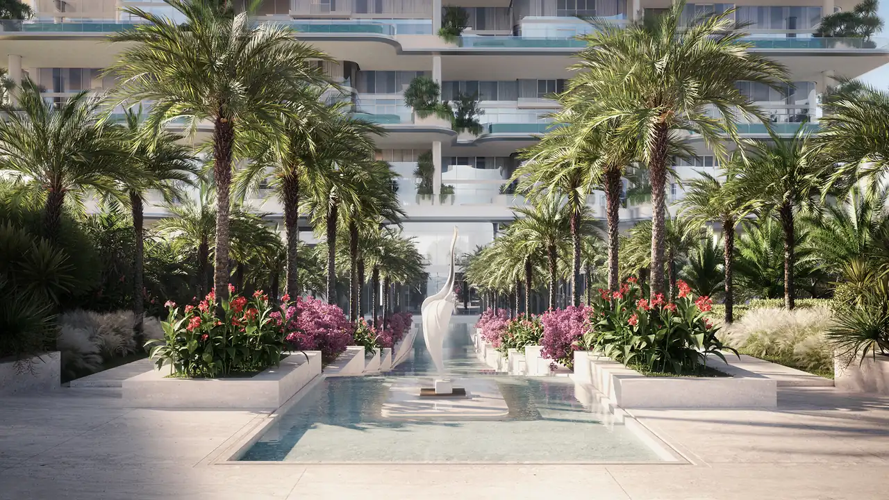 ORLA Infinity Dorchester Collection by Omniyat landscaped courtyard with reflecting pool sculptural centrepiece date palms and flowering beds beneath terraced residences in Dubai - Presented by Tohid Fetrat