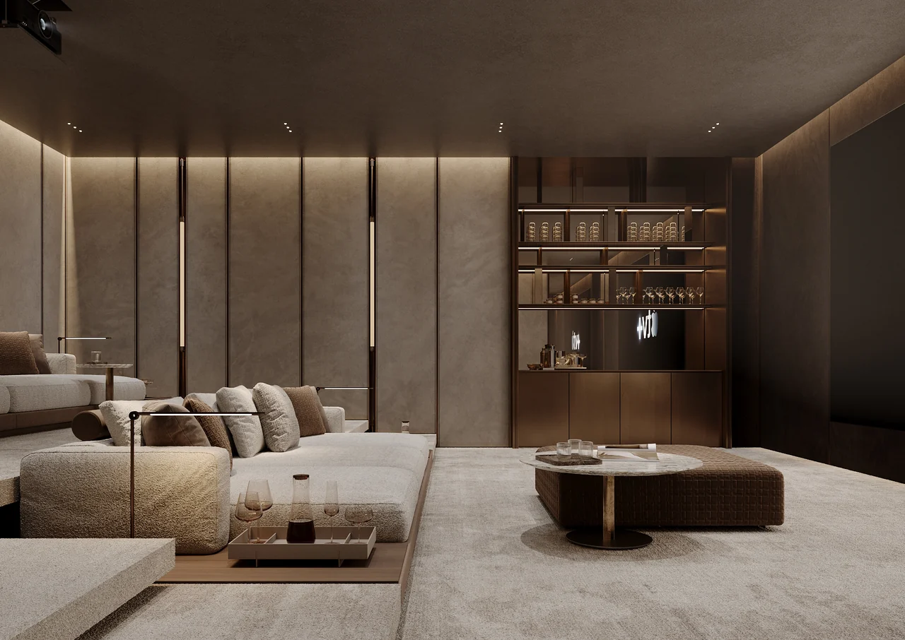 ORLA Infinity Dorchester Collection by Omniyat private cinema lounge with upholstered wall panels tiered seating bronze bar shelving and ambient lighting in Dubai - Presented by Tohid Fetrat