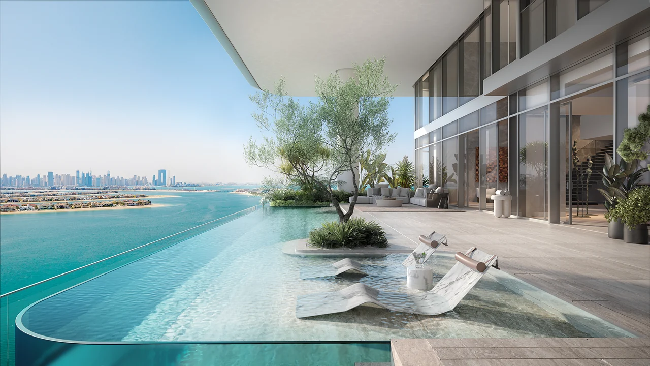 ORLA Infinity Dorchester Collection by Omniyat residence infinity pool terrace with marble sun loungers mature olive tree and Dubai Marina skyline views in Dubai - Presented by Tohid Fetrat