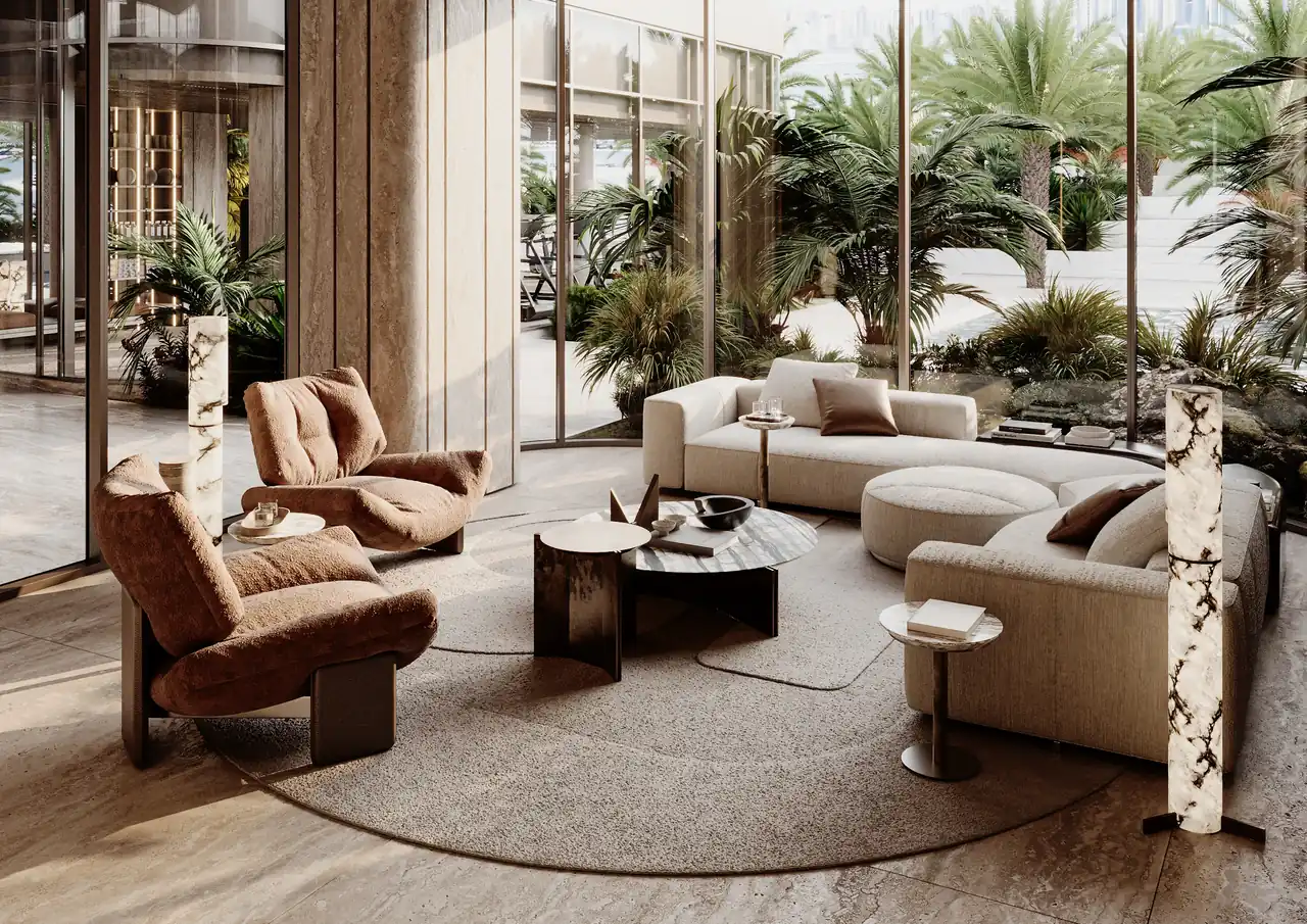 ORLA Infinity Dorchester Collection by Omniyat residents lounge seating area with textured armchairs marble tables sculptural rug and landscaped garden views in Dubai - Presented by Tohid Fetrat