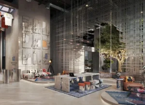 RAW District by Imtiaz creative residents lounge featuring designer workspace, artistic interiors, suspended architectural installation, and premium social spaces in Downtown Jebel Ali Dubai - Presented by Tohid Fetrat