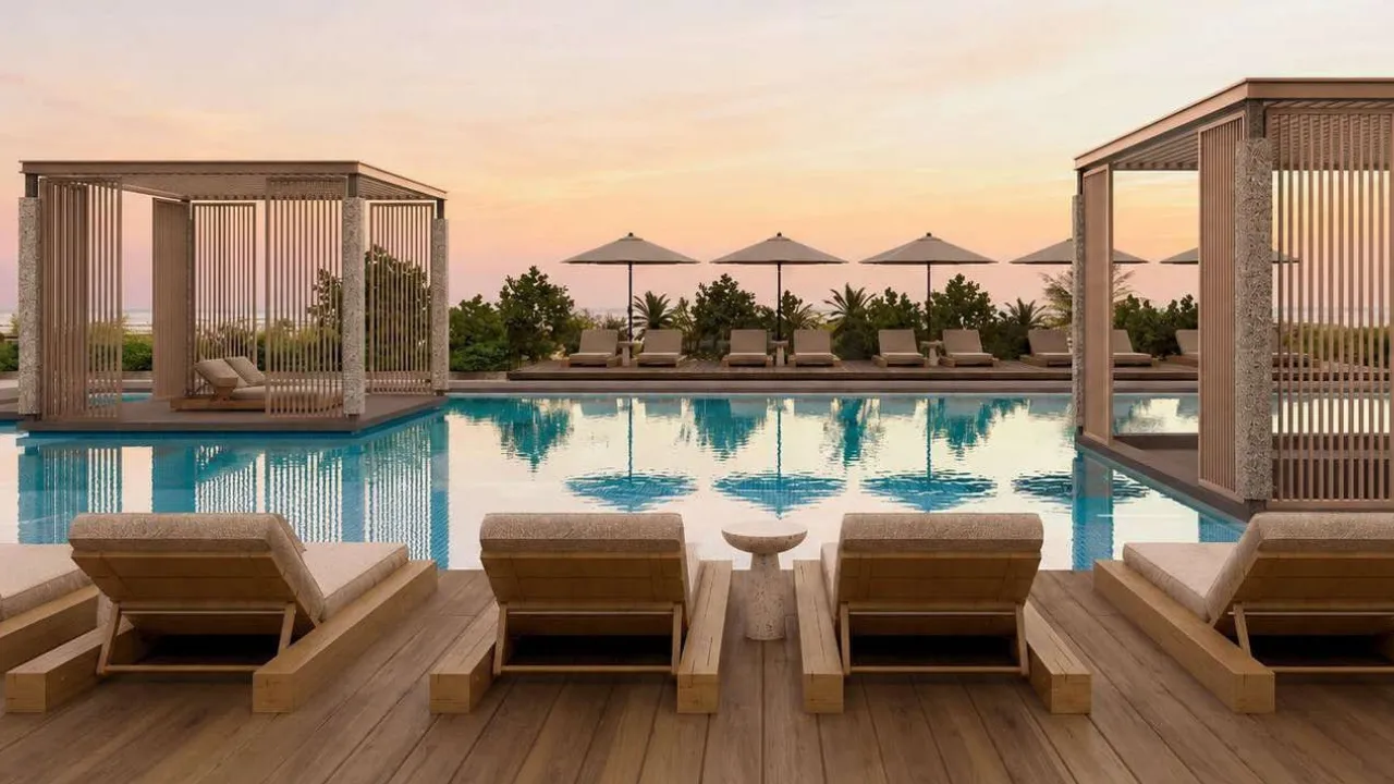 RAW District by Imtiaz in Downtown Jebel Ali infinity swimming pool with luxury cabanas, sun loungers, and resort style leisure spaces in Dubai - Presented by Tohid Fetrat