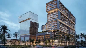 RAW District by Imtiaz in Downtown Jebel Ali mixed use exterior perspective featuring residential towers, office building, and retail podium in Dubai - Presented by Tohid Fetrat