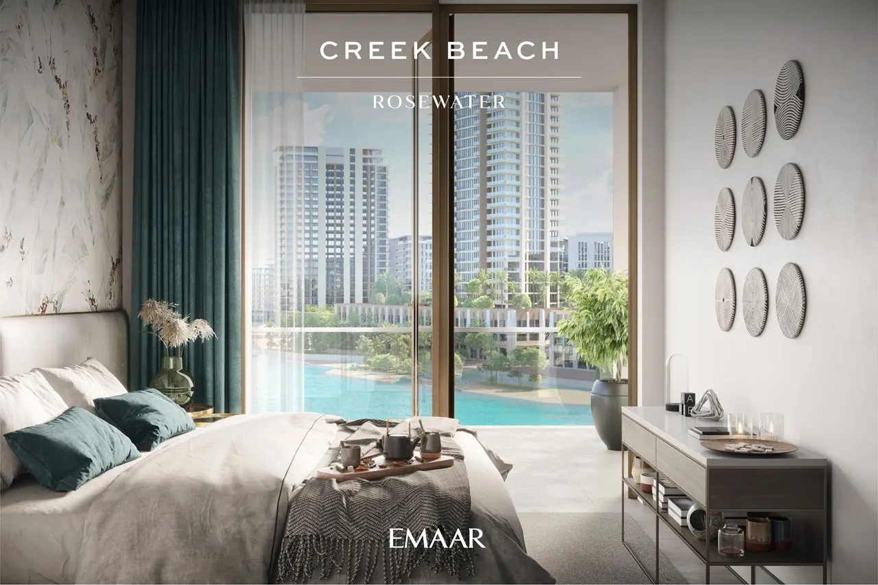 Rosewater at Dubai Creek Harbour by Emaar Properties contemporary bedroom with floor to ceiling windows overlooking the lagoon and landscaped community in Dubai Presented by Tohid Fetrat
