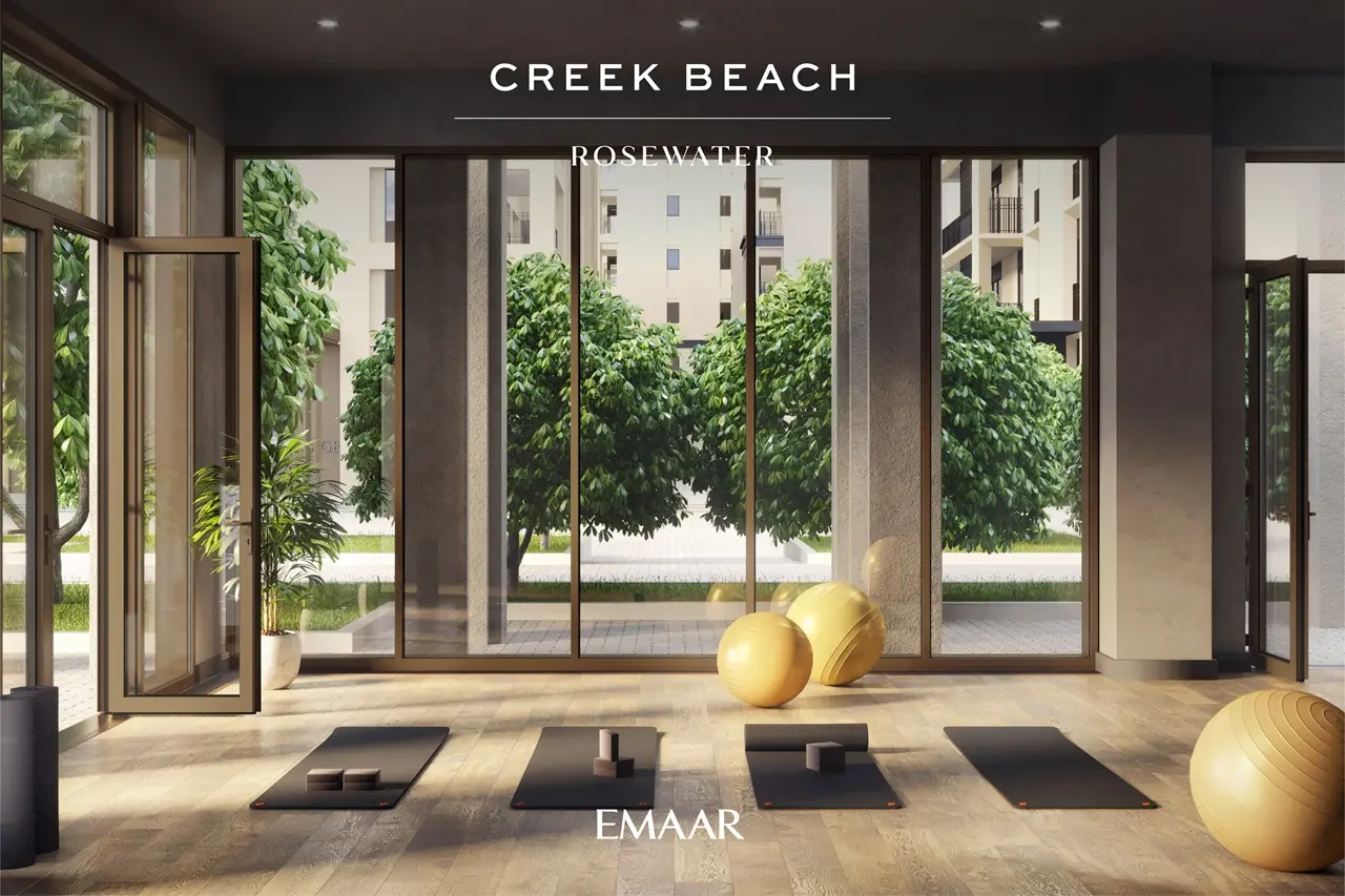 Rosewater at Dubai Creek Harbour by Emaar Properties modern fitness studio with yoga space and floor to ceiling windows in Dubai Presented by Tohid Fetrat