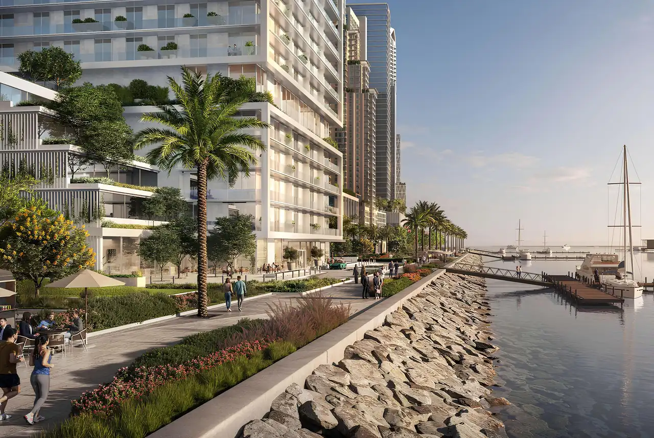 Saria by Beyond in Dubai Maritime City waterfront promenade linking the residences to the marina with landscaped walkways rock revetment and berthed yachts in Dubai - Presented by Tohid Fetrat