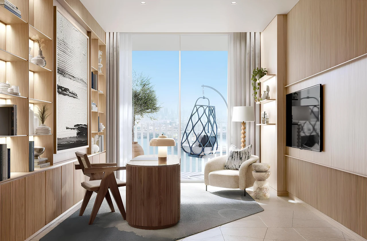 Saria by Beyond in Dubai Maritime City residence study with built in timber shelving a writing desk and a balcony hanging chair overlooking the water in Dubai - Presented by Tohid Fetrat