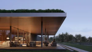 Selvara 3 at Grand Polo Club & Resort by Emaar Properties contemporary clubhouse with outdoor lounge overlooking landscaped surroundings in Dubai Presented by Tohid Fetrat