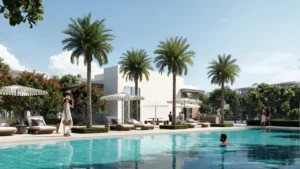 Selvara 3 at Grand Polo Club & Resort by Emaar Properties luxury community swimming pool with sun loungers and landscaped surroundings in Dubai Presented by Tohid Fetrat