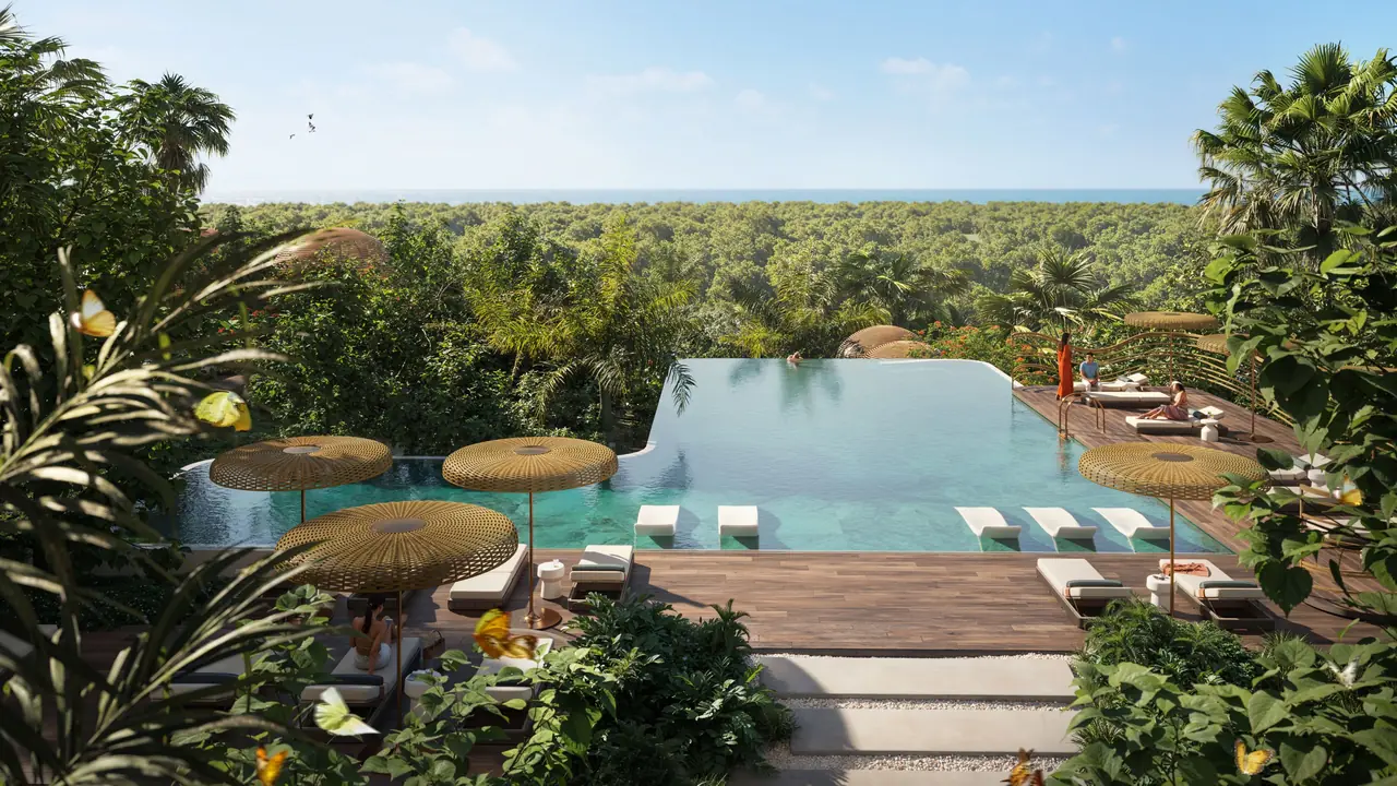Talea by Beyond in Dubai Maritime City outdoor pool deck with sun loungers landscaped terraces and open sea views in Dubai - Presented by Tohid Fetrat
