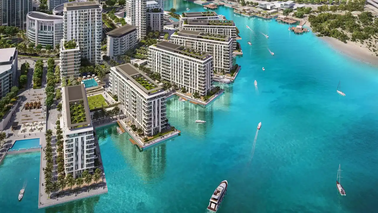 The Cove 2 at Dubai Creek Harbour by Emaar Properties aerial view of the waterfront residential community with modern apartments, marina and turquoise lagoon in Dubai Presented by Tohid Fetrat