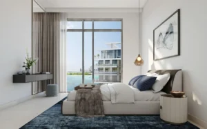 The Cove 2 at Dubai Creek Harbour by Emaar Properties contemporary bedroom interior with floor to ceiling windows overlooking the waterfront in Dubai Presented by Tohid Fetrat