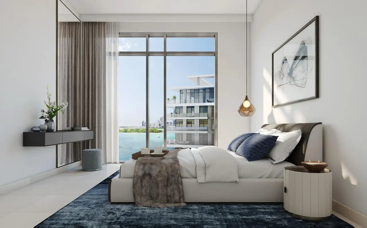 The Cove 2 at Dubai Creek Harbour by Emaar Properties contemporary bedroom interior with floor to ceiling windows overlooking the waterfront in Dubai Presented by Tohid Fetrat