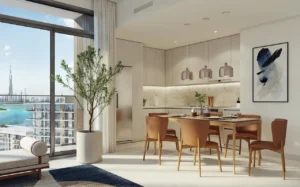 The Cove 2 at Dubai Creek Harbour by Emaar Properties contemporary kitchen and dining interior with floor to ceiling windows overlooking the waterfront in Dubai Presented by Tohid Fetrat