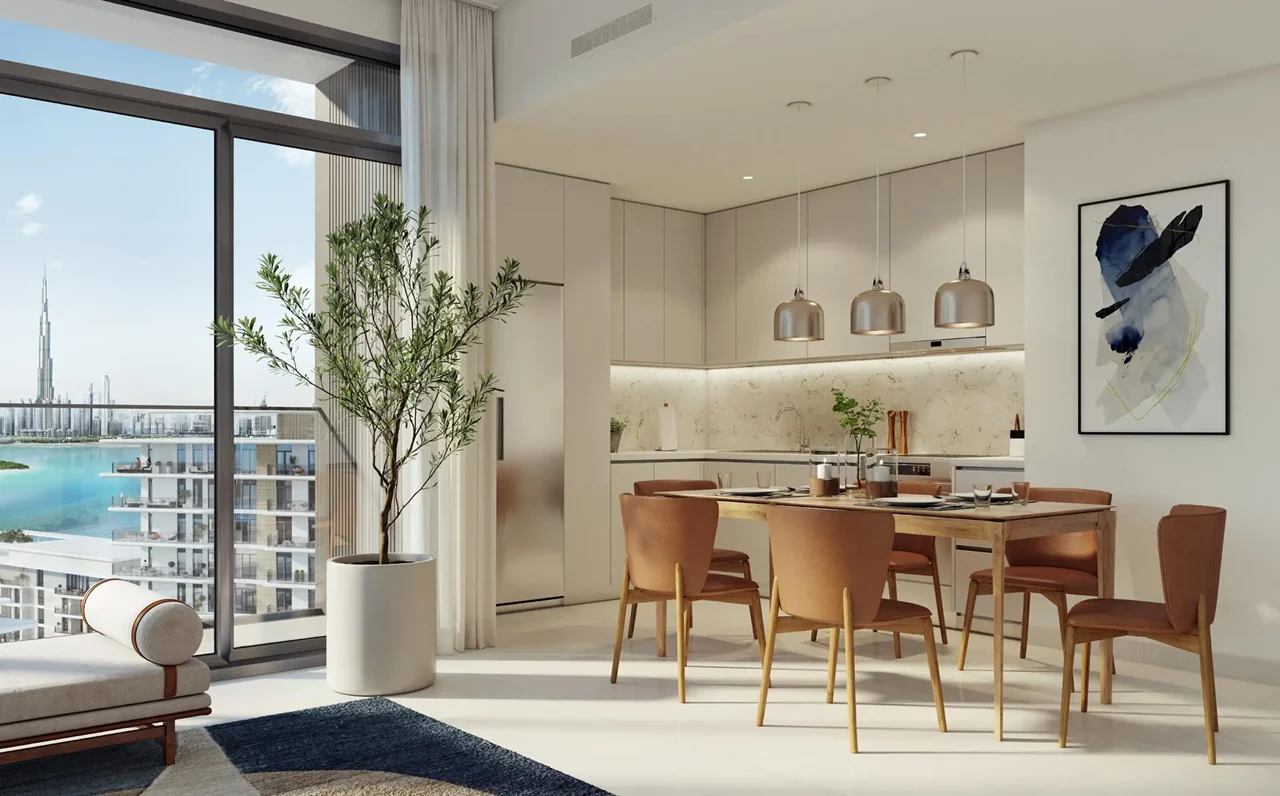 The Cove 2 at Dubai Creek Harbour by Emaar Properties contemporary kitchen and dining interior with floor to ceiling windows overlooking the waterfront in Dubai Presented by Tohid Fetrat