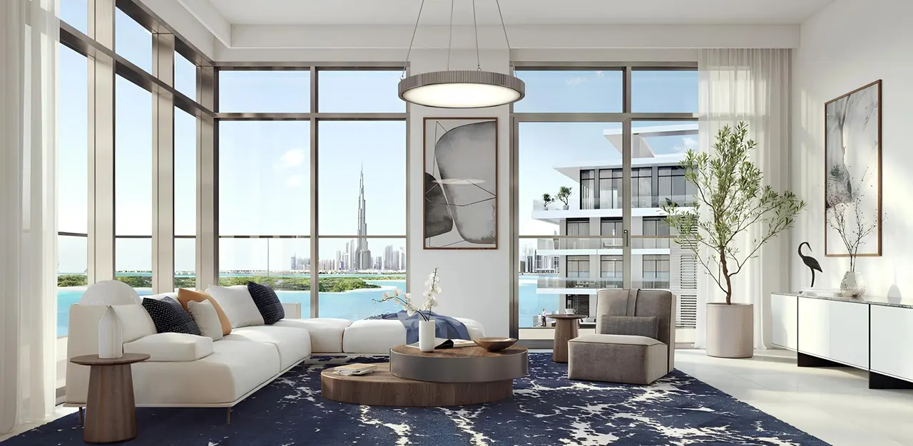 The Cove 2 at Dubai Creek Harbour by Emaar Properties contemporary living room interior with floor to ceiling windows overlooking the waterfront and Dubai skyline in Dubai Presented by Tohid Fetrat