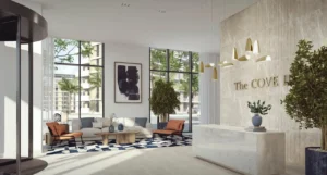The Cove 2 at Dubai Creek Harbour by Emaar Properties elegant lobby interior with reception desk, lounge seating and floor to ceiling windows in Dubai Presented by Tohid Fetrat