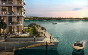 The Cove 2 at Dubai Creek Harbour by Emaar Properties waterfront promenade beside modern residential apartments overlooking the lagoon in Dubai Presented by Tohid Fetrat