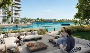 The Cove 2 at Dubai Creek Harbour by Emaar Properties waterfront outdoor terrace with landscaped seating area overlooking the lagoon in Dubai Presented by Tohid Fetrat