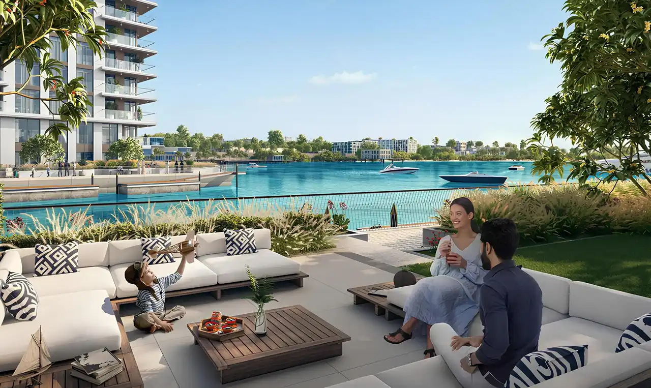 The Cove 2 at Dubai Creek Harbour by Emaar Properties waterfront outdoor terrace with landscaped seating area overlooking the lagoon in Dubai Presented by Tohid Fetrat